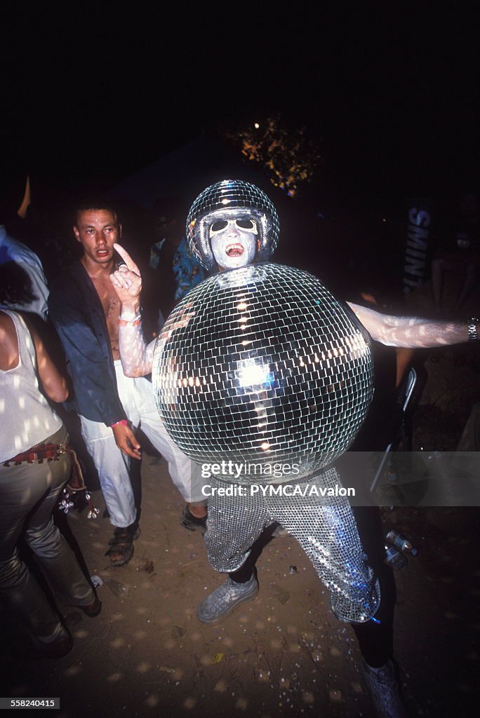 Wow! its a man dressed as a discoball....UK, 1990s