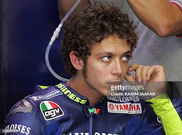 Italian rider and world champion Valentino Rossi of Yamaha is seen before a free practice session of Qatar Grand Prix World Championships in Doha 29...