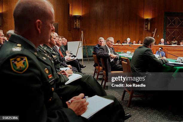 General Richard Myers, USAF, Chairman of the Joint Chiefs of Staff and U.S. Secretary of Defense Donald Rumsfeld listen as General George Casey,...