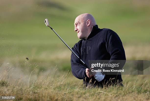 Ex rugby international Keith Wood of Ireland plays his third shot on the par four 17th hole during the first round of the Dunhill Links Championships...