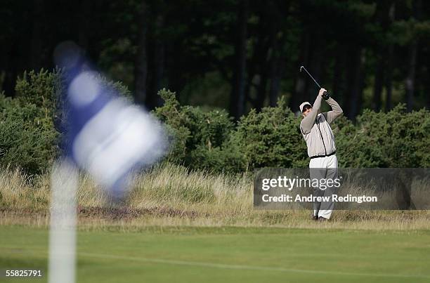 Actor Michael Douglas plays his third shot to the 12th green during the first round of the Dunhill Links Championships at the Carnoustie Golf Club,...