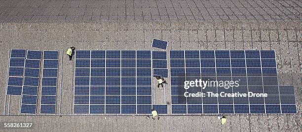 solar panel installation - installation art stock-fotos und bilder