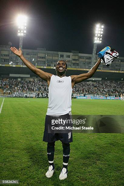 Jay Jay Okocha of Bolton celebrates at the final whistle during the UEFA Cup 1st round second leg match between and Lokomotiv Plovdiv and Bolton...