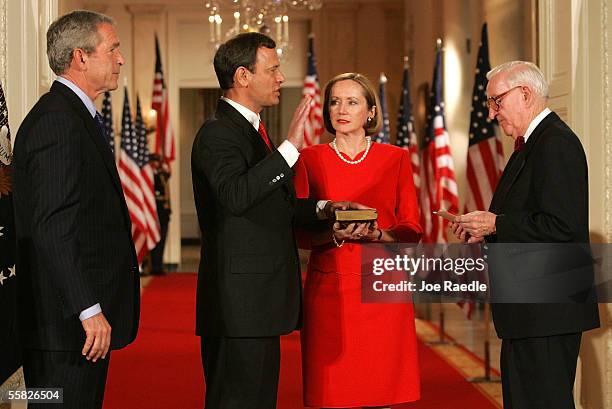 George Beel U.S. President George W. Bush watches while John Roberts is sworn in ...