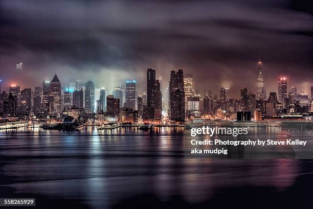a gotham night - gotham stock pictures, royalty-free photos & images