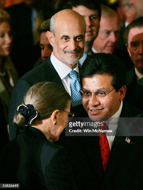 Attorney General Alberto Gonzalez greets U.S. Supreme Court Associate Justice Ruth Bader Ginsburg in the East Room at the White House following a...