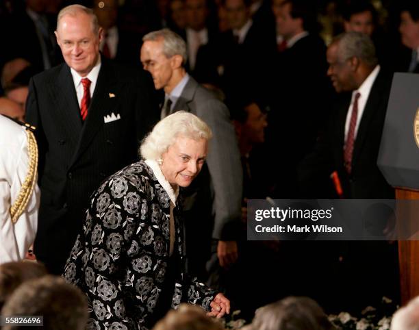 Supreme Court Associate Justice Sandra Day O'Connor enters the East Room followed by Supreme Court Associate Anthony M. Kennedy, Supreme Court...