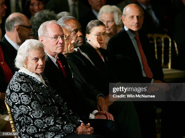 Supreme Court Justices Sandra Day O'Connor, Anthony Kennedy, David Souter, Clarence Thomas, Ruth Bader Ginsburg and Stephen Breyer watch the...