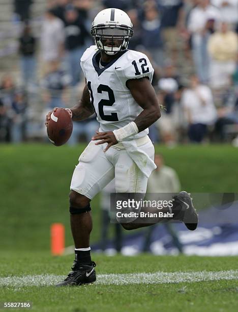 Quarterback Michael Robinson of the Penn State Nittany Lions rolls out to pass against the Northwestern Wildcats September 24, 2005 at Ryan Field in...