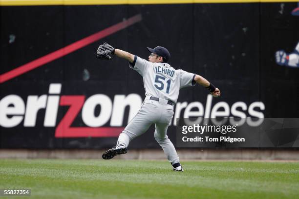 Ichiro Suzuki of the Seattle Mariners throws the ball from the outfield during the game against the Detroit Tigers at Comerica Park on September 25,...