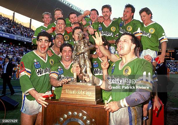 The Canberra Raiders celebrate winning the 1989 NSWRL Grand Final between the Canberra Raiders and the Balmain Tigers held at the Sydney Football...