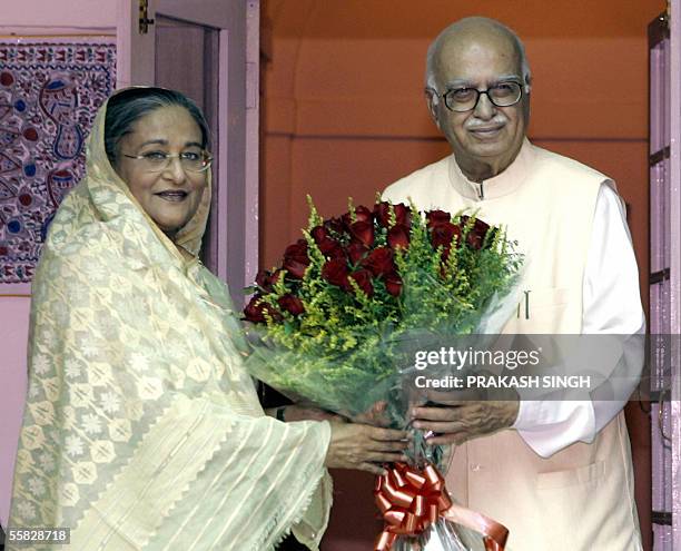 Indian Bhartiya Janata Party President and Leader of Opposition L. K. Advani welcomes former Bangladesh Prime Minister Sheikh Hasina Wajed with a...