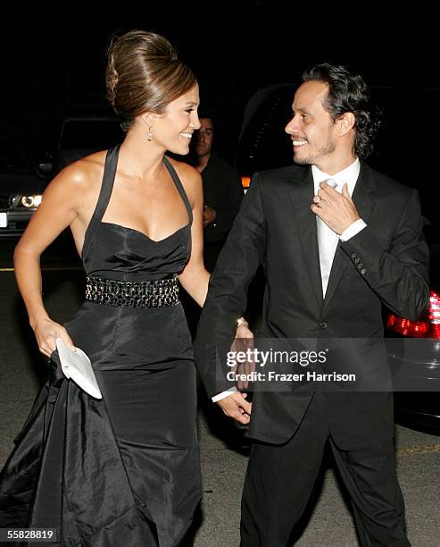 Actress Jennifer Lopez and her husband singer Marc Anthony arrive at the 2005 Macy's Passport Gala held at Barker Hanger on September 29, 2005 in...