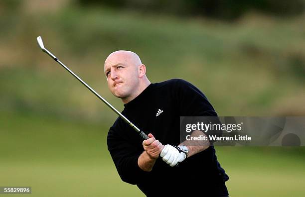 Rugby player Keith Wood of Ireland plays his second shot on the 4th hole during the second round of the Dunhill Links Championship on September 30,...