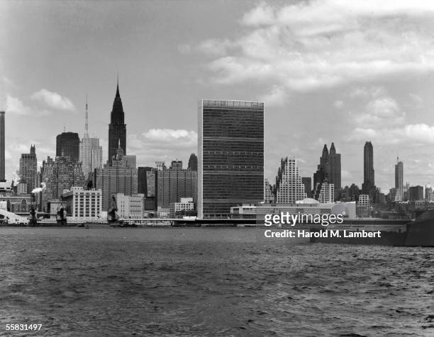 General view of the East Midtown skyline from across the East River looking West, New York, New York, 1950s or 1960s. Prominant structures include...