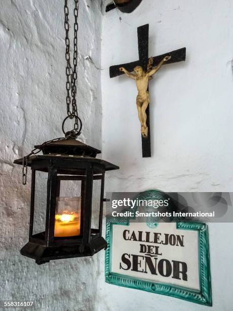 decorative street sign on narrow alley in spain - frigiliana stock pictures, royalty-free photos & images