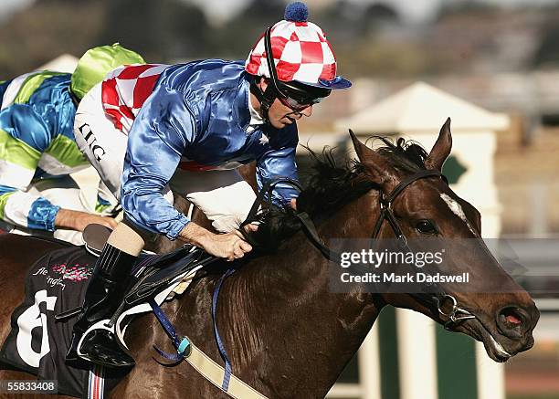 Steven King riding Makybe Diva wins the Turnbull Stakes during the Turnbull Stakes Day at Flemington Racecourse October 1, 2005 in Melbourne,...