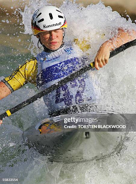 Jennifer Bongardt of Germany pierces through the whitewater during the finals of the K1 Kayak Slalom Racing World Championships at Penrith Lakes near...