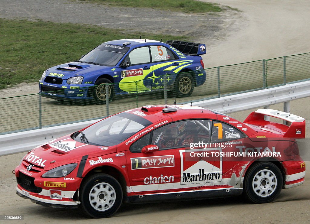Rally Racer Driver Finnish rally driver Marcus Gronholm and his co-driver Timo... News ...