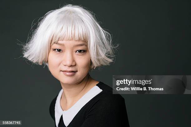 self-confidence asian woman - bleached hair stock pictures, royalty-free photos & images