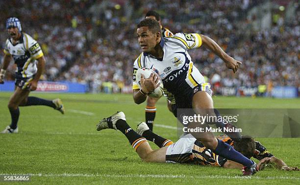 Matt Bowen of the Cowboys heads for a try during the 2005 NRL Grand Final between Wests Tigers and the North Queensland Cowboys at Telstra Stadium on...