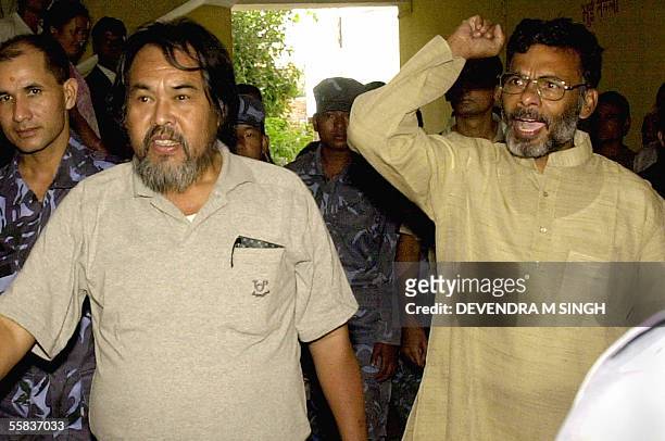 Two Maoist leaders Suresh Ale Magar and Matrika Yadav shout slogans at the Appellate Court Lalitpur on the outskirts of Kathmandu, 02 October 2005....