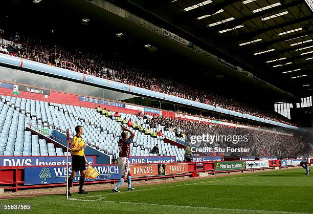 Wilfred Bouma of Aston Villa takes a throw in front of empty seats during the Barclays Premiership match between Aston Villa and Middlesbrough at...