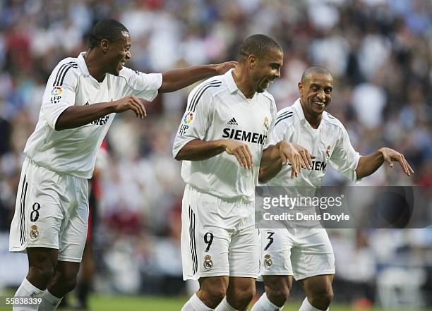 Julio Baptiste and Roberto Carlos of Real Madrid celebrate with goalscorer Ronaldo during the Real Madrid v Mallorca La Liga match played at the...