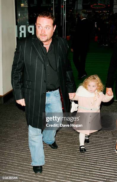 Actor John Thomson and his daughter Olivia arrive at the UK Charity premiere of animated film "Wallace & Gromit: The Curse Of The Were-Rabbit" at the...