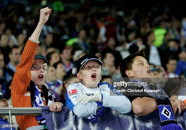 Fans of Hamburg shout during the Bundesliga match between 1. FC Kaiserslautern and Hamburger SV at Fritz-Walter Stadium on October 2, 2005 in...