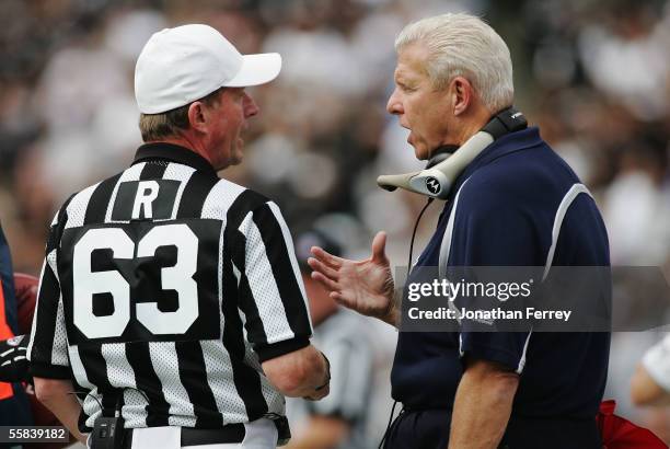 Head Coach Bill Parcells of the Dallas Cowboys discusses a play with referee Bill Carollo during the game against the Oakland Raiders on October 2,...