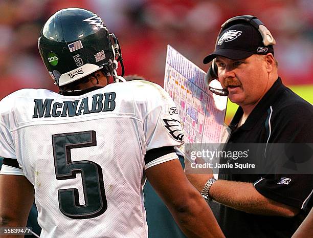 Head coach Andy Reid of the Philadelphia Eagles talks with quarterback Donovan McNabb during the second half of the game against the Kansas City...