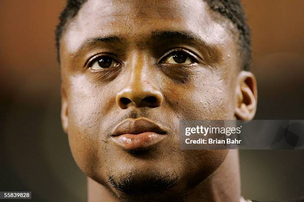 Warrick Dunn of the Atlanta Falcons stands on the field for an interview after defeating the Minnesota Vikings on October 2, 2005 at the Georgia Dome...