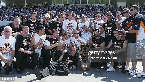 The Tigers pose with the NRL Premiership trophy during the Wests Tigers Grand Final celebrations at Campbelltown Sports Ground on October 3, 2005 in...