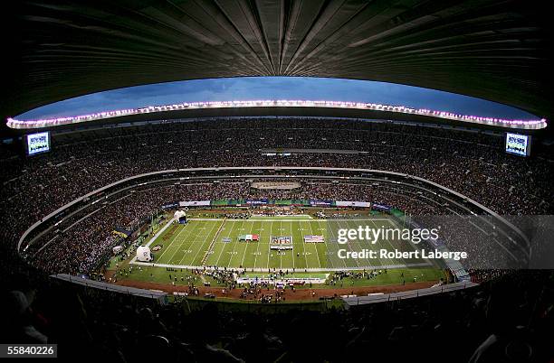 The American and Mexican flags are displayed on the field during the pre-game ceremony before the game between the Arizona Cardinals and the San...