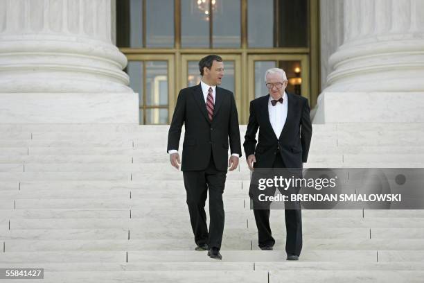 Washington, UNITED STATES: Chief Justice John G. Roberts, Jr. And Associate Justice John Paul Stevens walk down the steps of the Supreme Court 03...