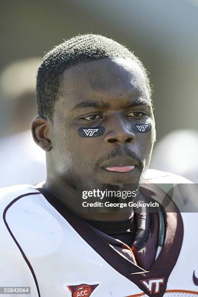 Quarterback Marcus Vick of the Virginia Tech Hokies watches the action from the sideline during a game against the West Virginia University...