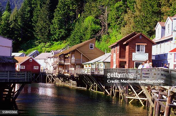 stilt houses along a creek, creek street, ketchikan, alaska, usa - revillagigedo island alaska stockfoto's en -beelden