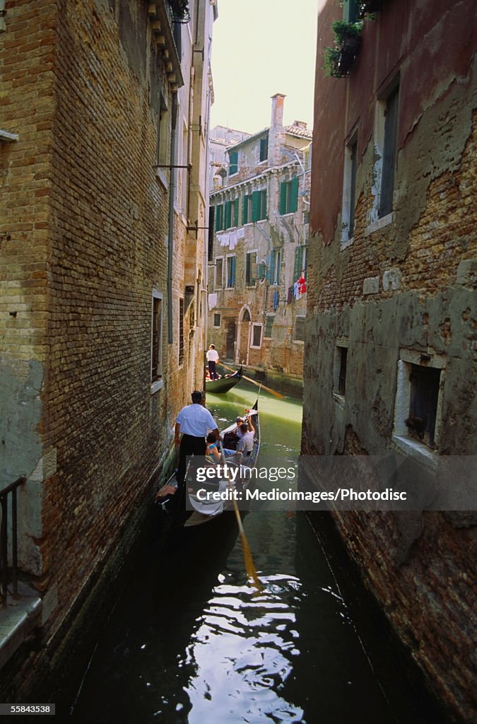 Gondola with tourist, Venice, Italy