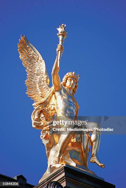 statue of eros, dresden, germany - touched by an angel stockfoto's en -beelden