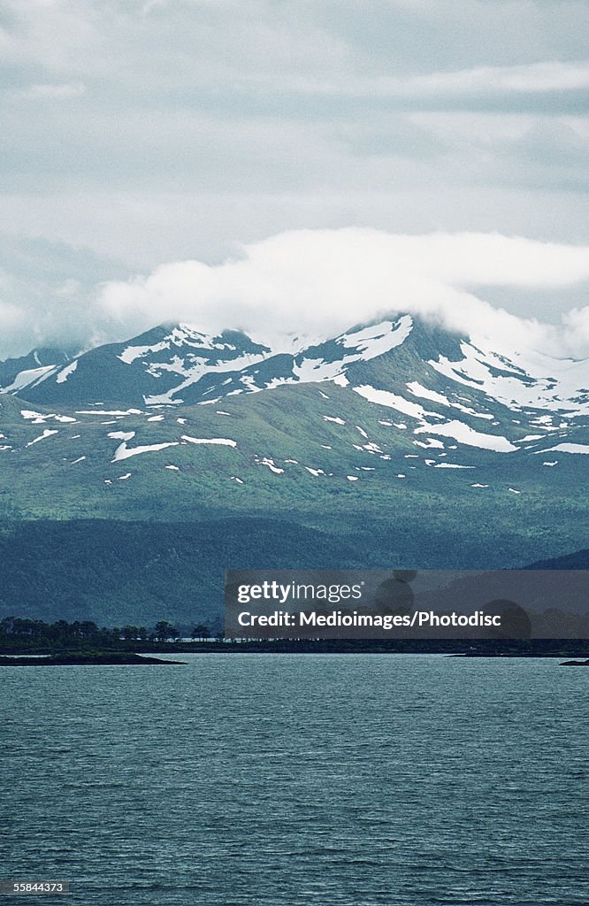 Cloud over the mountain peak, Hjertoya Island, Molde, Norway