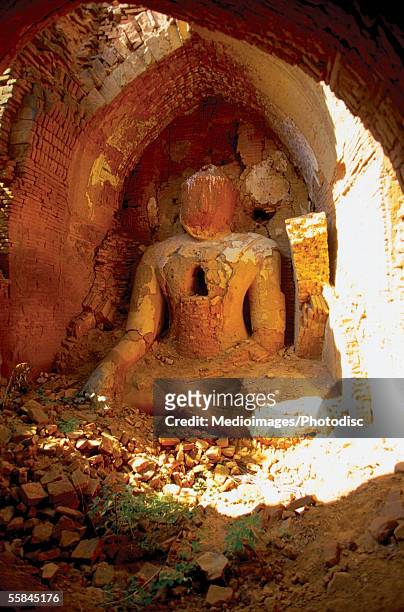 damaged bhudda statue, bagan, myanmar - bagan stock pictures, royalty-free photos & images