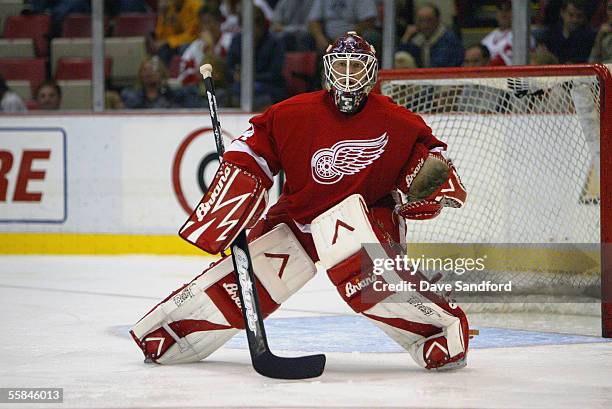 Goalie Manny Legace of the Detroit Red Wings protects the goal from the Columbus Blue Jackets during the preseason game at the Joe Louis Arena on...