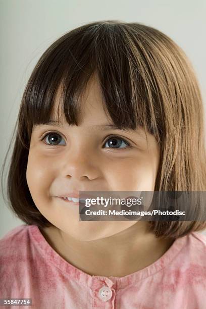 close-up of a girl smiling - medium length hair stock pictures, royalty-free photos & images