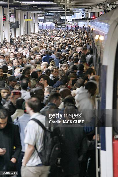 Commutors wait for one of the rare local trains at Paris Gare du Nord, 04 October 2005. More than a million people are expected to take part in...