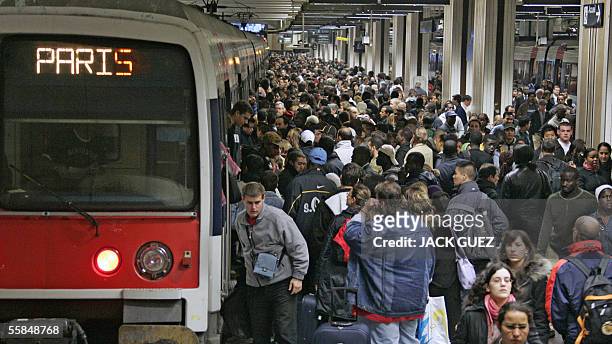 Commutors wait for one of the rare local trains at Paris Gare du Nord, 04 October 2005. More than a million people are expected to take part in...