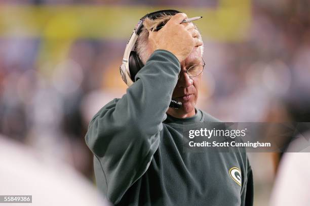 Head Coach Mike Sherman of the Green Bay Packers contemplates his next play against the Carolina Panthers at Bank Of America Stadium on October 3,...