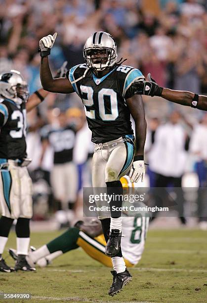 Chris Gamble of the Carolina Panthers celebrates after breaking up a pass to Donald Driver of the Green Bay Packers on 4th down to clinch the win at...