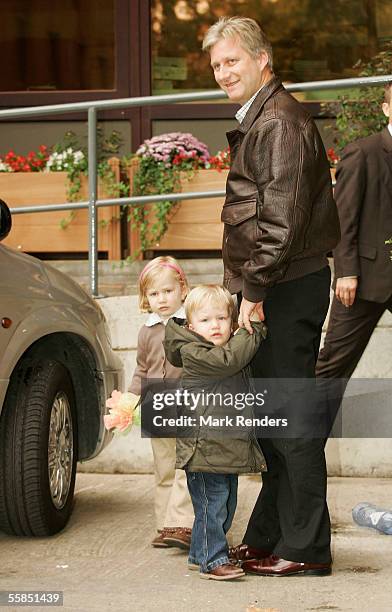 Crown Prince Philippe, Prince Gabriel and Princess Elisabeth of Belgium arrive at the Erasmus Hospital to visit Crown Princess Mathilde, who gave...