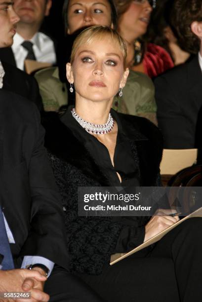 Actress Sharon Stone attends the Dior fashion show as part of Paris Fashion Week Spring/Summer 2006 on October 4, 2005 in Paris, France.